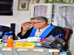 أ.م.د اياد محمد حسين يشارك في عضوية لجنة مناقشة رسالة الماجستير بجامعة بغداد كلية اللغات